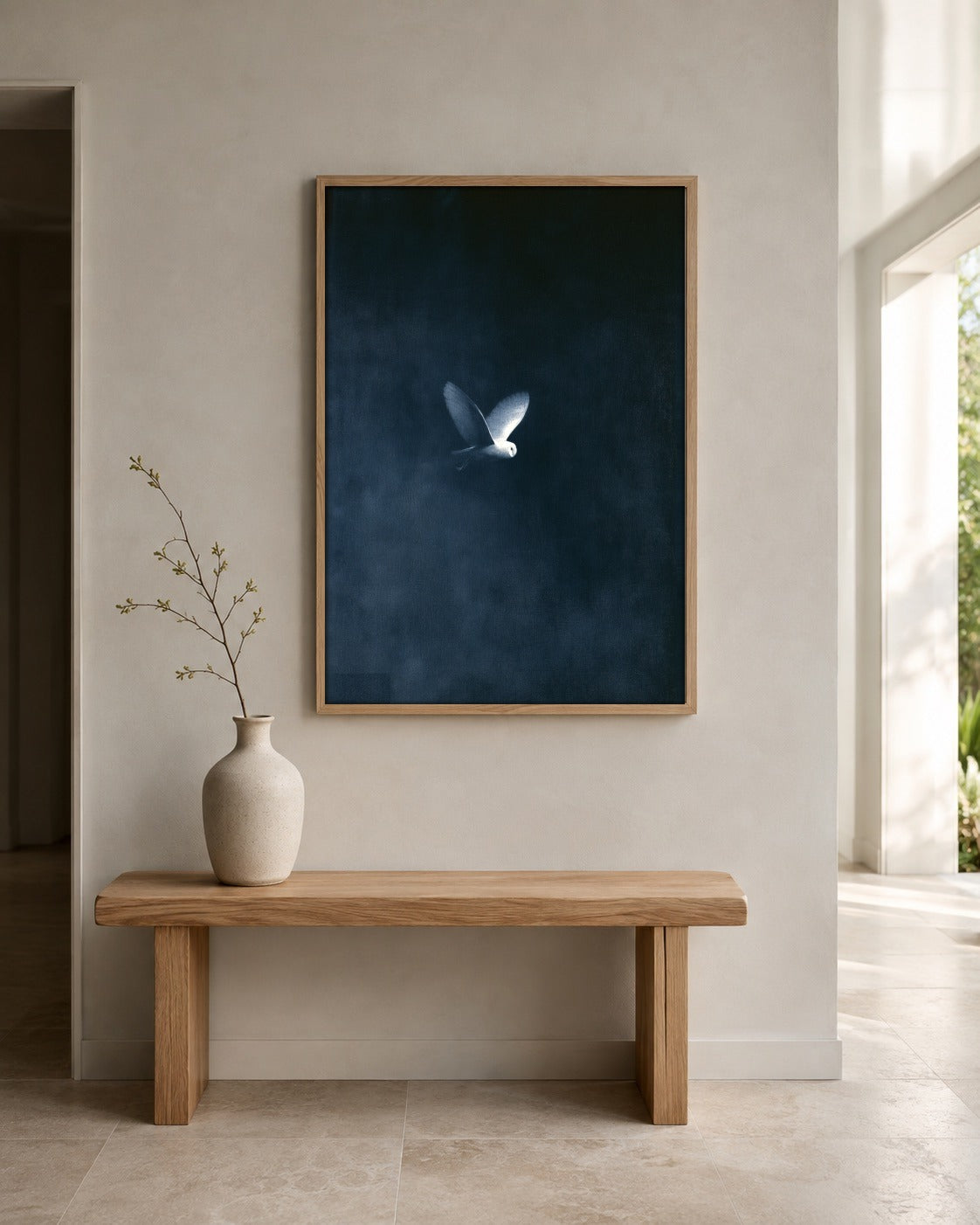 The White Wing dark teal bird wall art displayed in a home interior