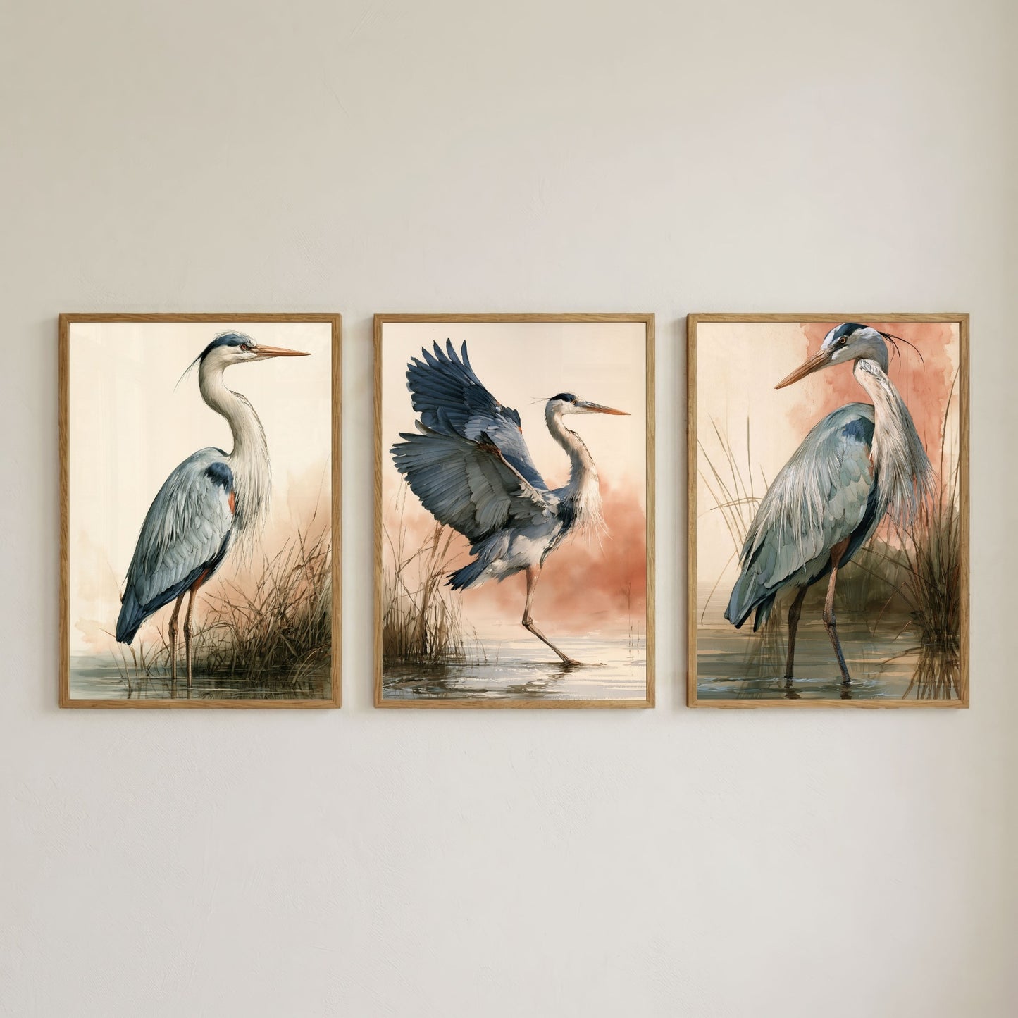 Set of three heron wall art prints in natural oak frames