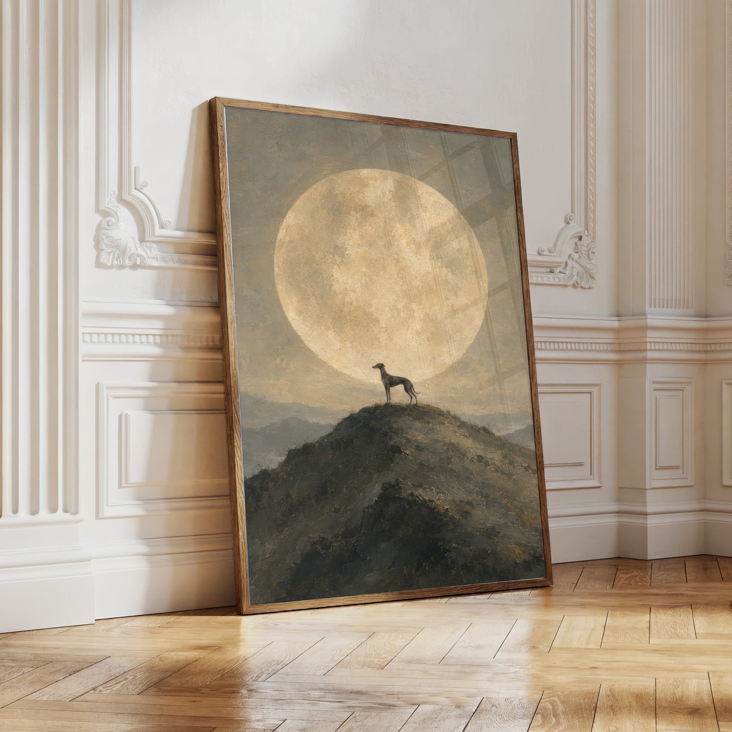 Fine art painting of a greyhound standing on a hilltop beneath a large gold full moon in a dark night sky.
