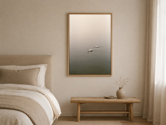 Two in the Mist swan wall art, framed in a styled interior
