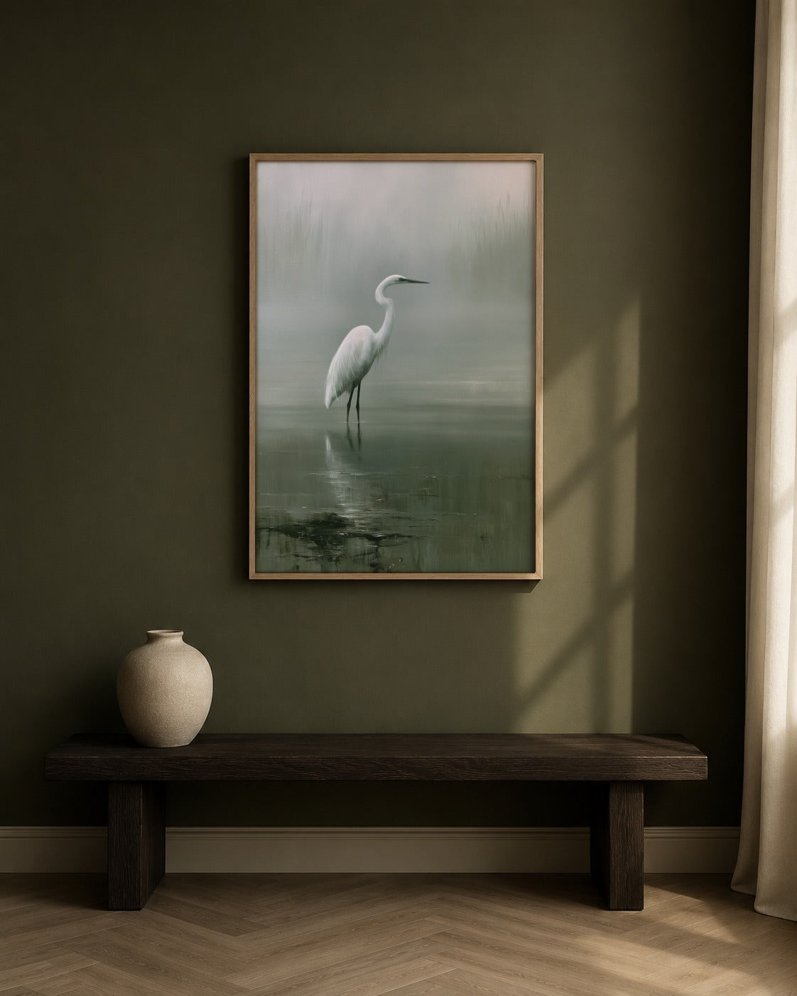 The Pale Heron green heron wall art, framed in a styled interior