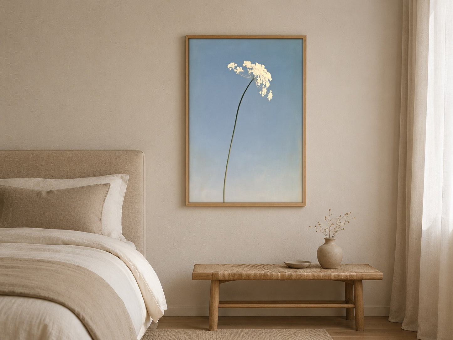 A Quiet Bloom blue botanical wall art, framed in a styled interior